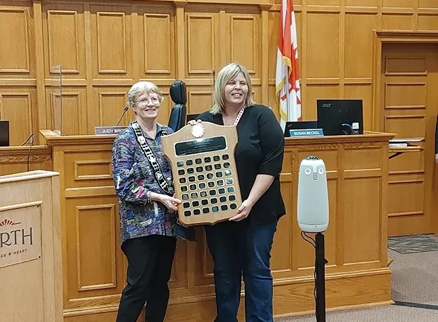 Perth Mayor Judy Brown presents Jackie Hart with the 2022 Perth Medal Award