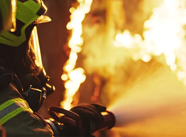 Firefighters fighting fire.