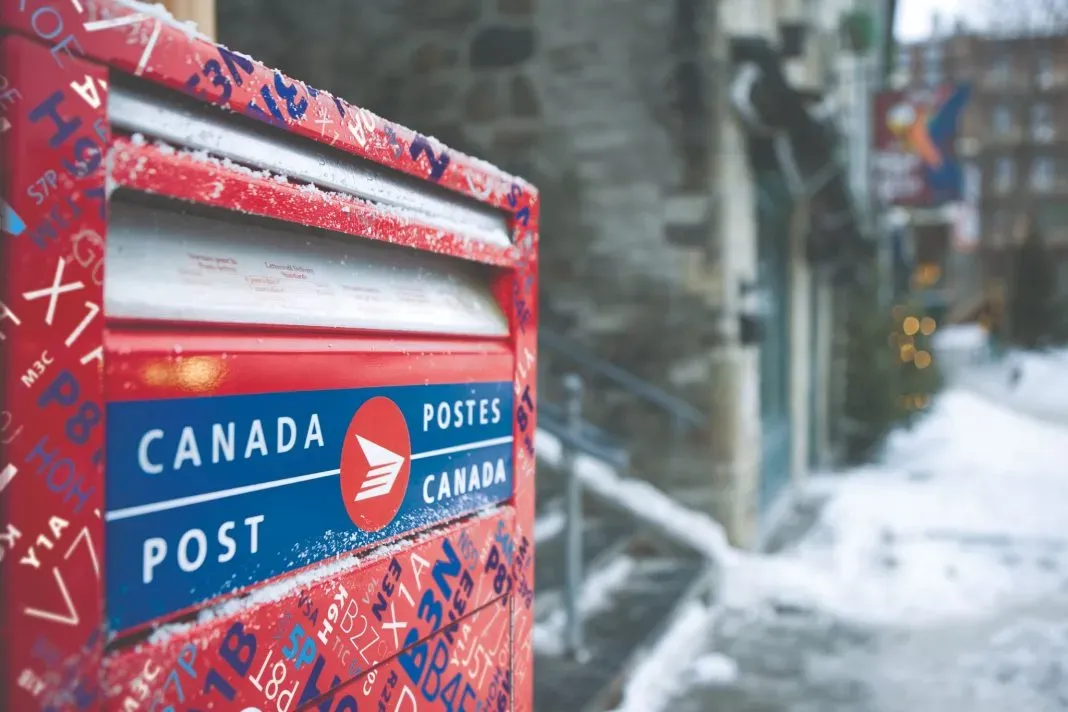 Upclose shot of a Canada Post red mail box. Canada Post strike.