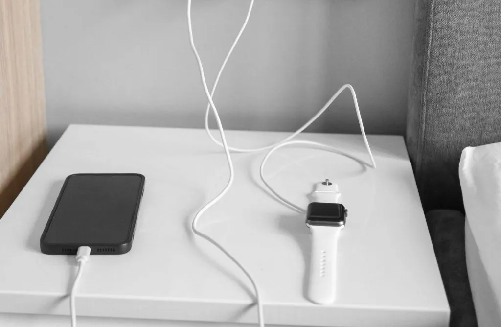 Devices charging on a flat side table, one of the tips for Fire Prevention Week