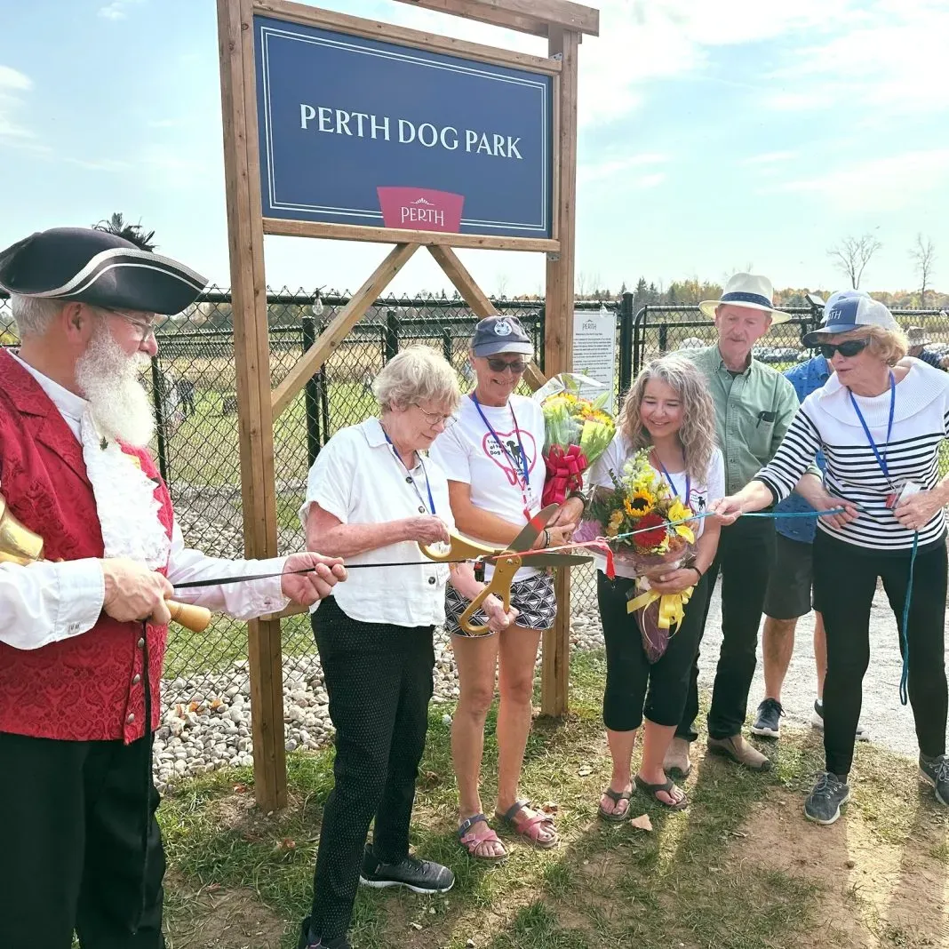 Ribbon cutting a the grand opening of the Perth Dog Park