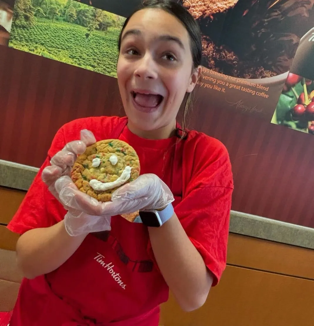 Messina decorated a cookie last year during the Tim Hortons Holiday Smile Cookie campaign